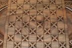 The backgammon board opened to show the wooden playing surface