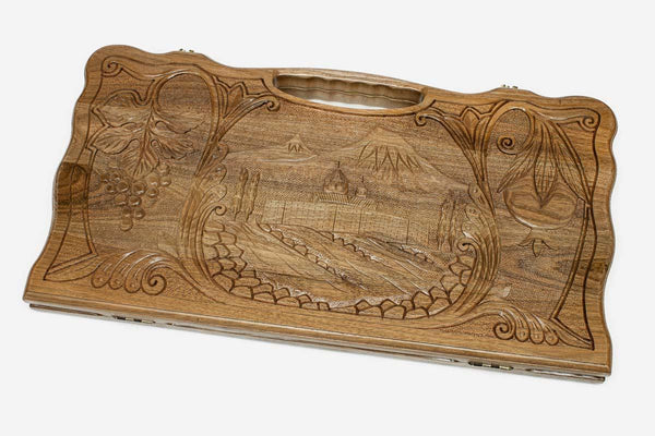 Carved walnut backgammon board with a scene of Mount Ararat and Khor Virap monastery, propped open