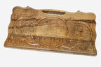 Carved walnut backgammon board with three carved scenes and a carry handle, propped open