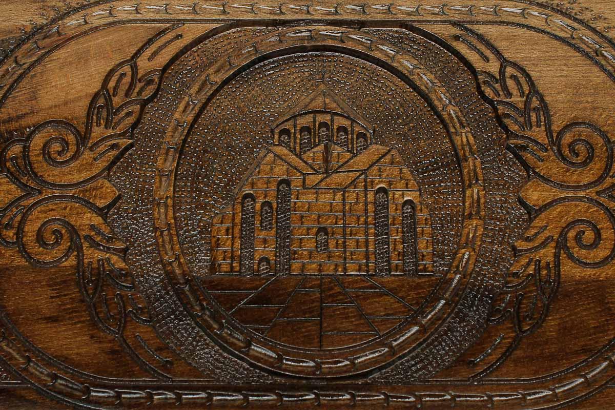 The backgammon board opened to show the wooden playing surface