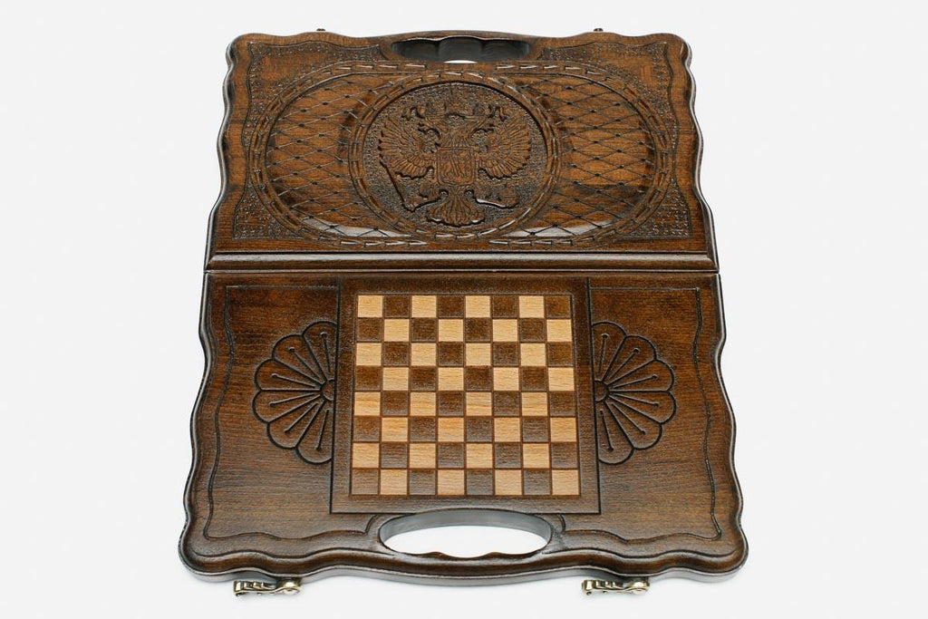 Side view of the folded travel board with its carry handle