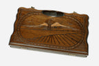 Compact carved backgammon board with Mount Ararat and a carry handle, propped open