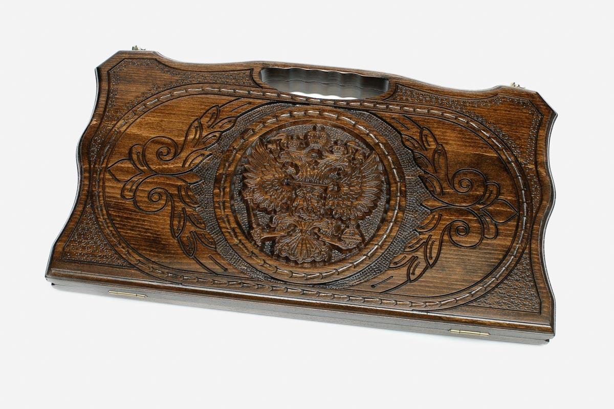 Carved backgammon board with the Russian coat of arms and a carry handle, propped open