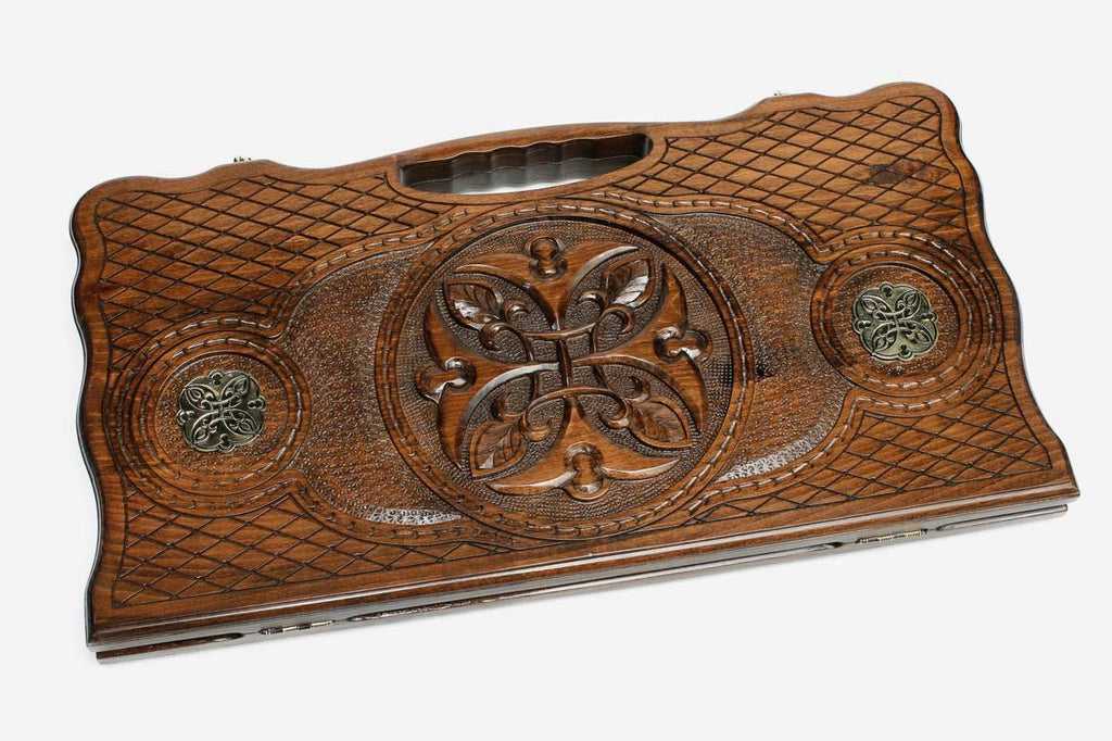 Angled view of the ornament and bronze backgammon board