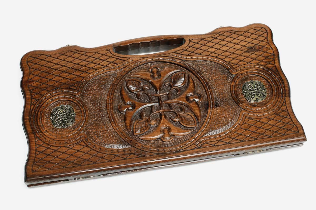 Angled view of the ornament and bronze backgammon board