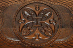 The backgammon board opened to show the wooden playing surface