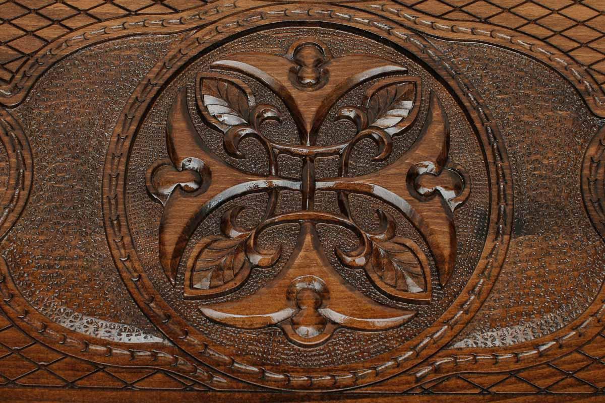 The backgammon board opened to show the wooden playing surface