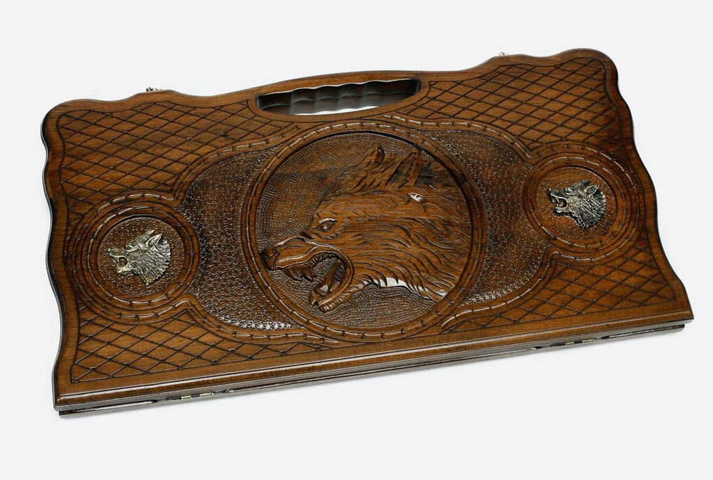 Angled view of the lion and wolf bronze backgammon board