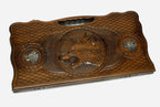 Angled view of the lion and wolf bronze backgammon board