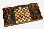 The backgammon board opened to show the wooden playing surface