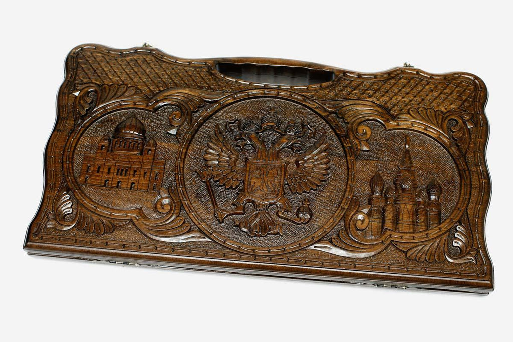 Carved beechwood backgammon board with three Russian landmark carvings and a carry handle, propped open