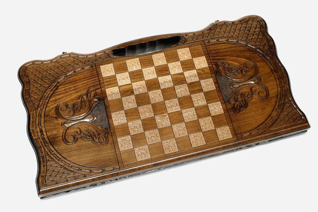 The backgammon board opened to show the wooden playing surface