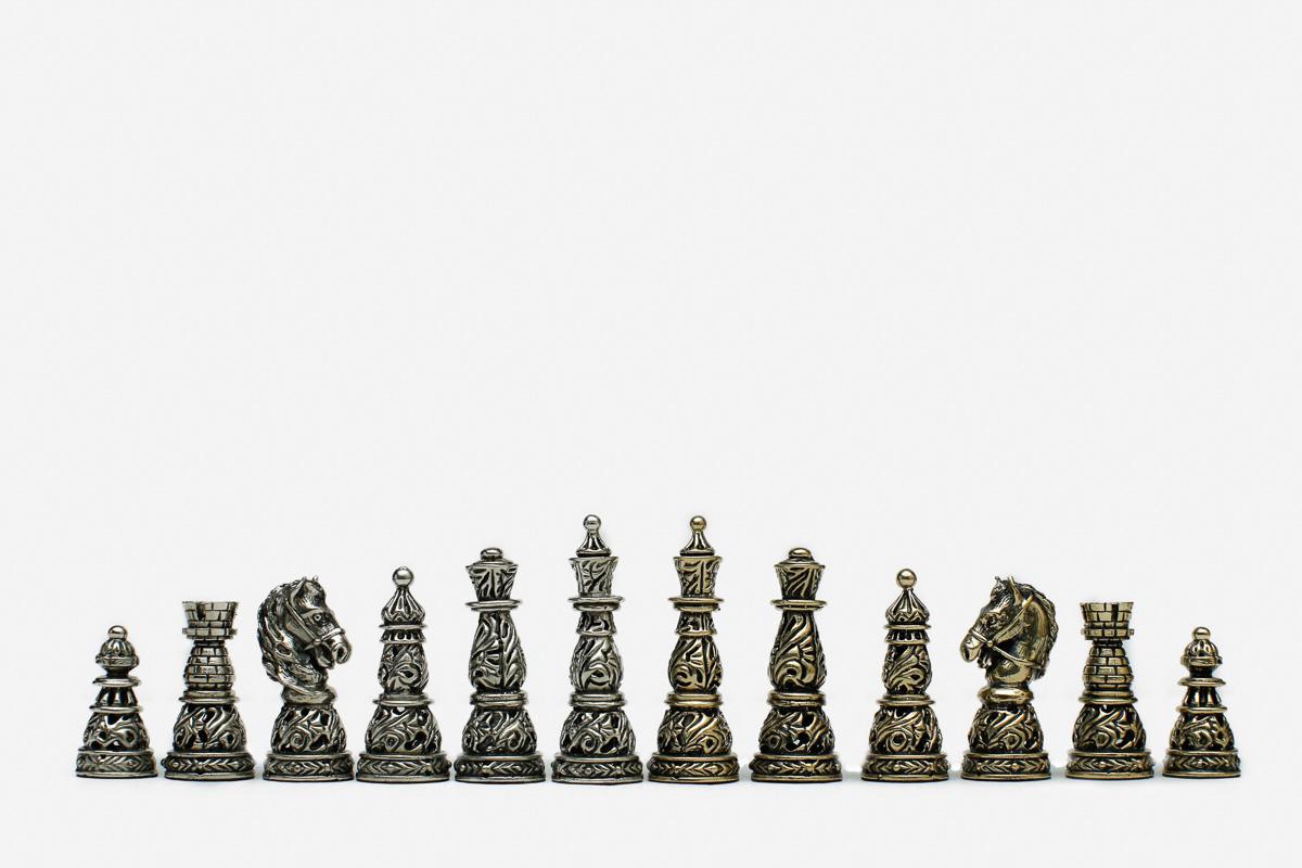 Figural bronze chess pieces on the 15.7 inch / 40 cm carved board
