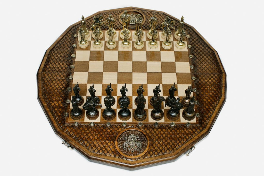 Luxury twelve-sided Russian chess set with an inlaid double-headed eagle and ornate bronze pieces set up for play