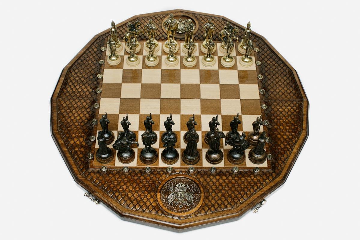 Luxury twelve-sided Russian chess set with an inlaid double-headed eagle and ornate bronze pieces set up for play