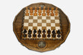 Luxury twelve-sided Russian chess set with an inlaid double-headed eagle and turned wooden pieces set up for play