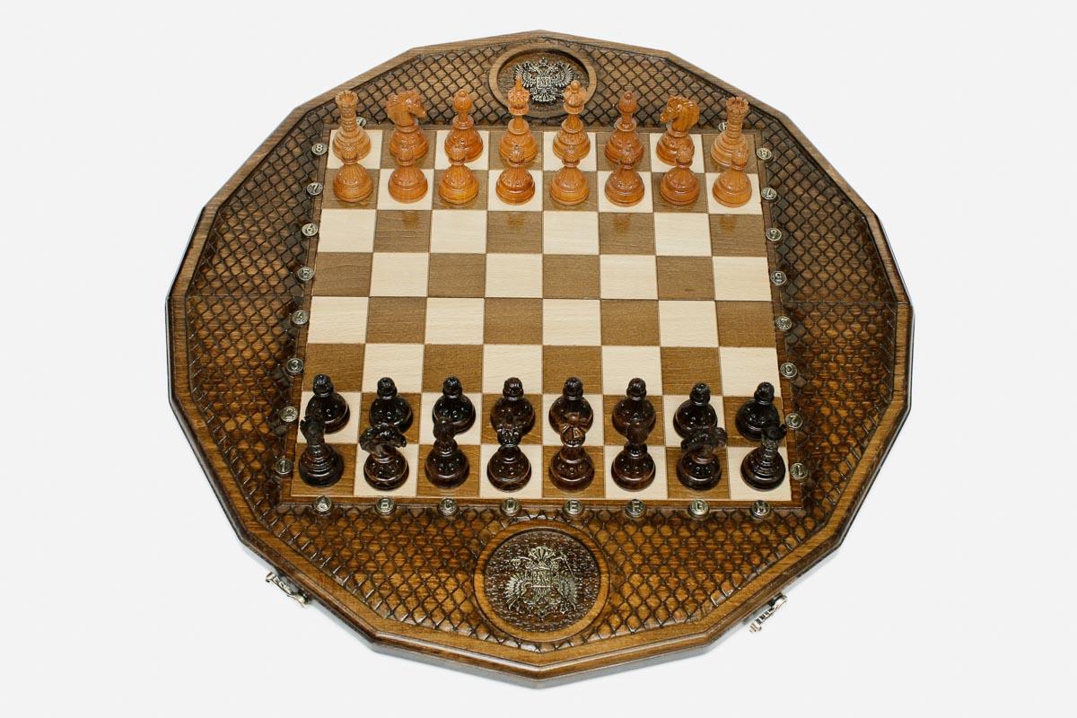 Luxury twelve-sided Russian chess set with an inlaid double-headed eagle and turned wooden pieces set up for play