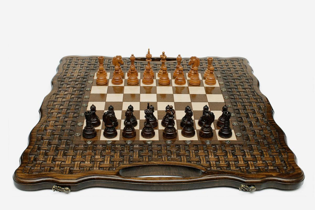 Lattice-carved folding board in solid beech with bronze clasps