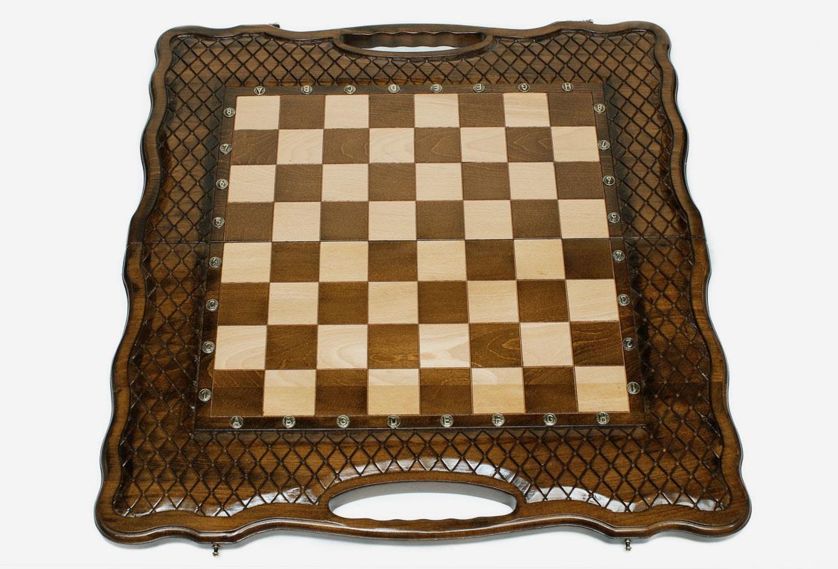 Close-up of the interlocking diamond carving on the beech frame