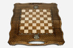 Figural bronze chess pieces on the carved Russian board