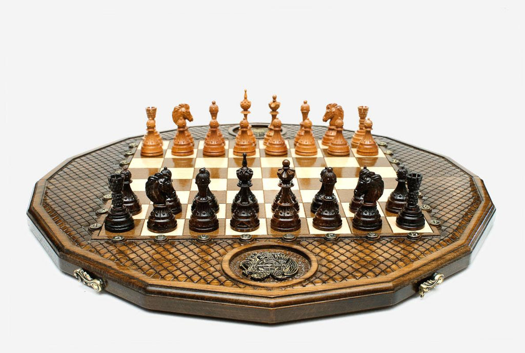 Luxury twelve-sided Armenian chess set with inlaid coat of arms and turned wooden pieces set up for play