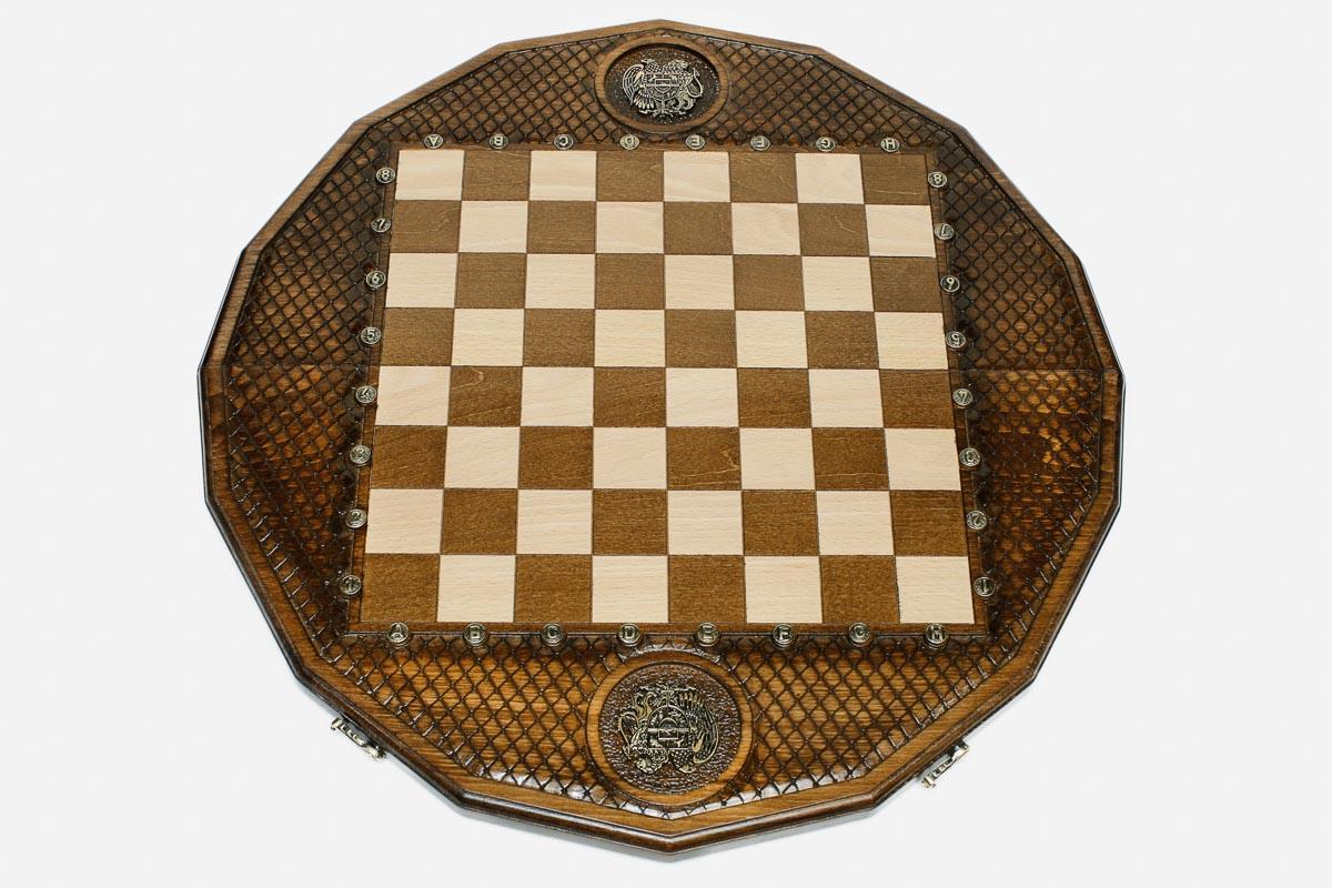 Overhead view of the lattice-carved board, inlaid coat of arms and full bronze army