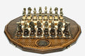 Luxury twelve-sided Armenian chess set with an inlaid coat of arms and ornate bronze pieces set up for play
