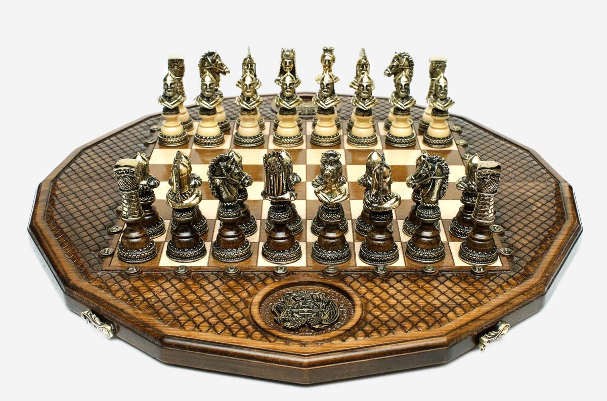 Luxury twelve-sided Armenian chess set with an inlaid coat of arms and ornate bronze pieces set up for play