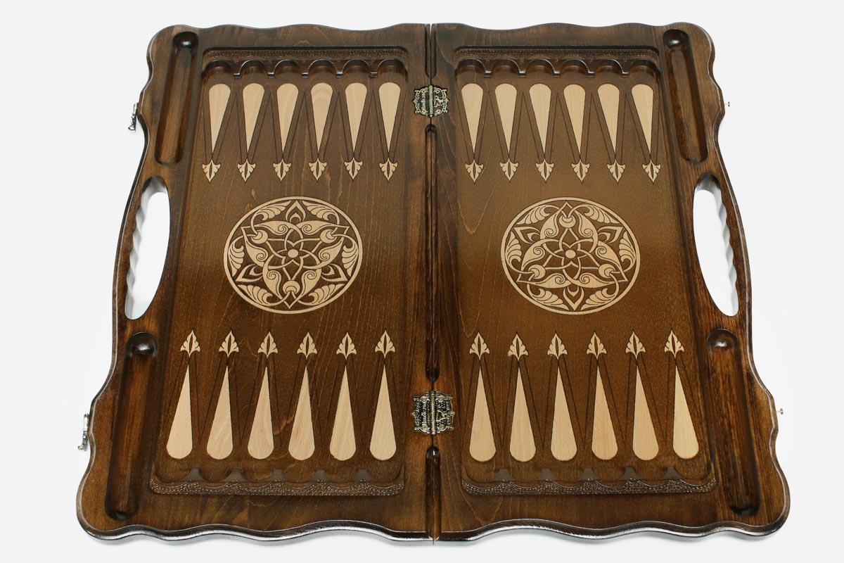 Close-up of the carved classic border on the beech board