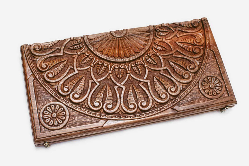 Angled view of the master fan ornament walnut backgammon board