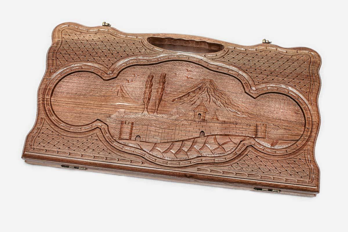 Carved walnut backgammon board with Mount Ararat and Khor Virap monastery and a carry handle, propped open