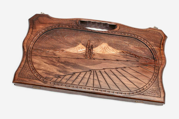 Carved backgammon board with Mount Ararat at its center, propped open