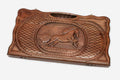 Carved walnut backgammon board with a horse at its center and a carry handle, propped open