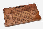 Angled view of the carved horse backgammon board