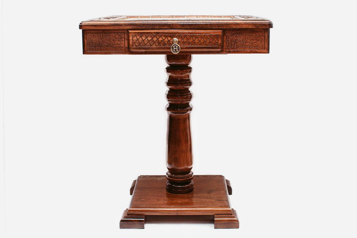 Carved wooden chess table with bronze army, angled view