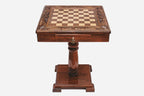 Hand-carved chess table on its pedestal, side profile