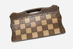 The walnut chess set shown closed with its built-in carry handle
