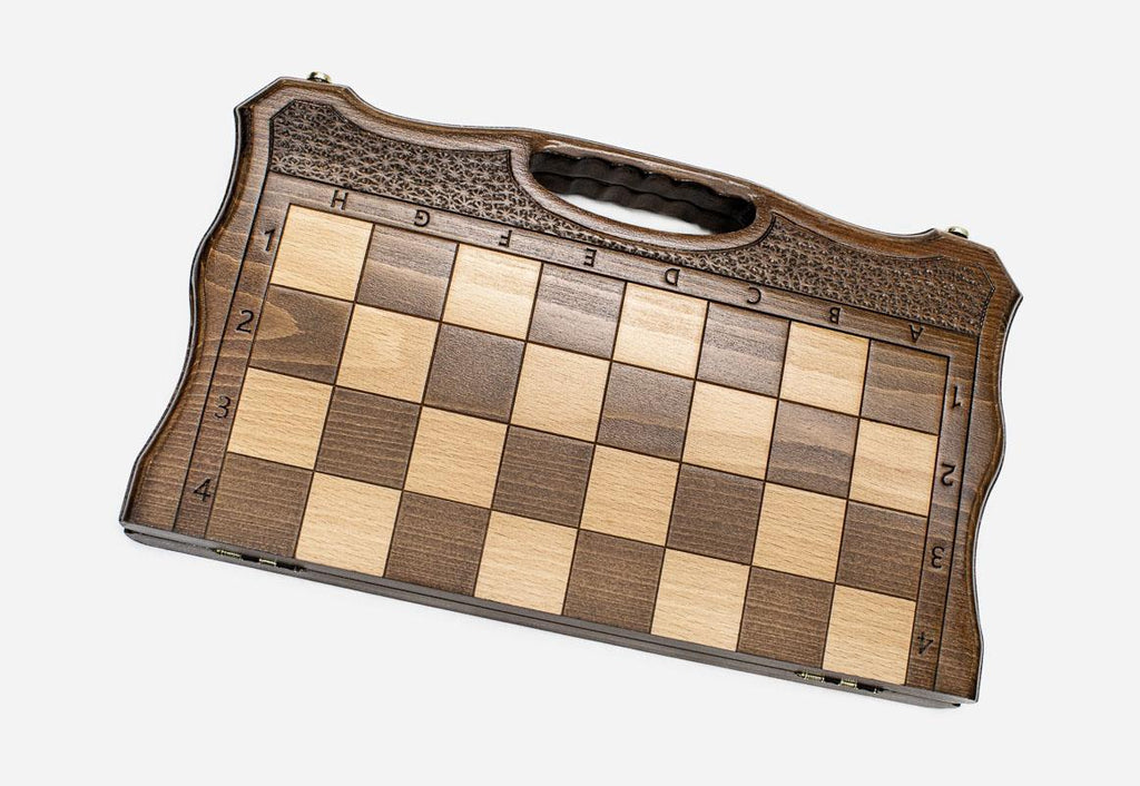 Angled view of the folding walnut chess set with its beech and walnut pieces