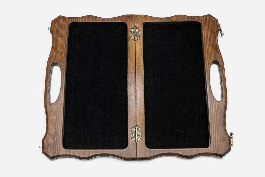 Overhead view of the chess board with the full set of light and dark pieces