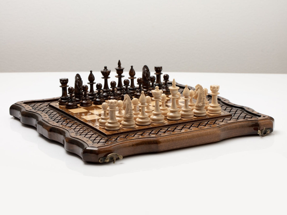 Carved wooden chess set from an angled view