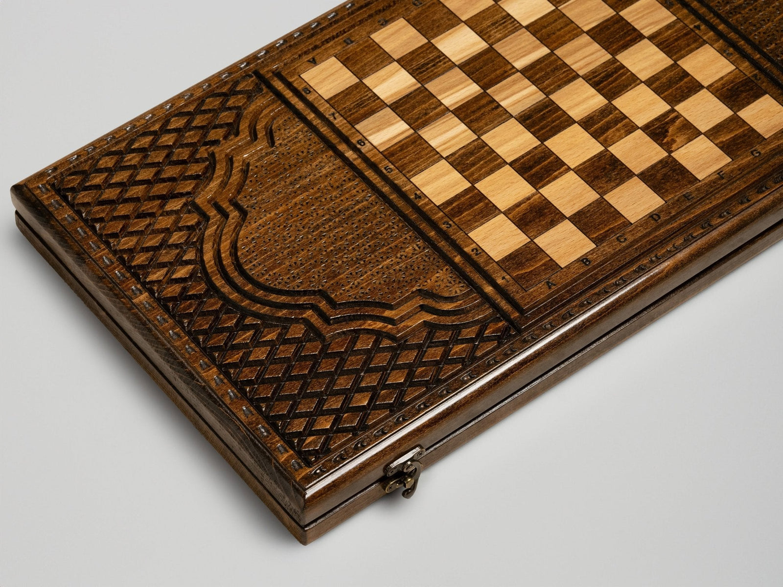 Wooden playing pieces and dice of the Armenian backgammon set