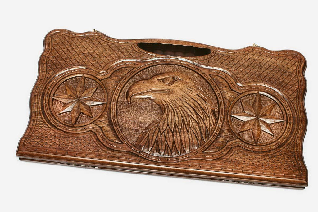 The backgammon board opened to show the wooden playing surface