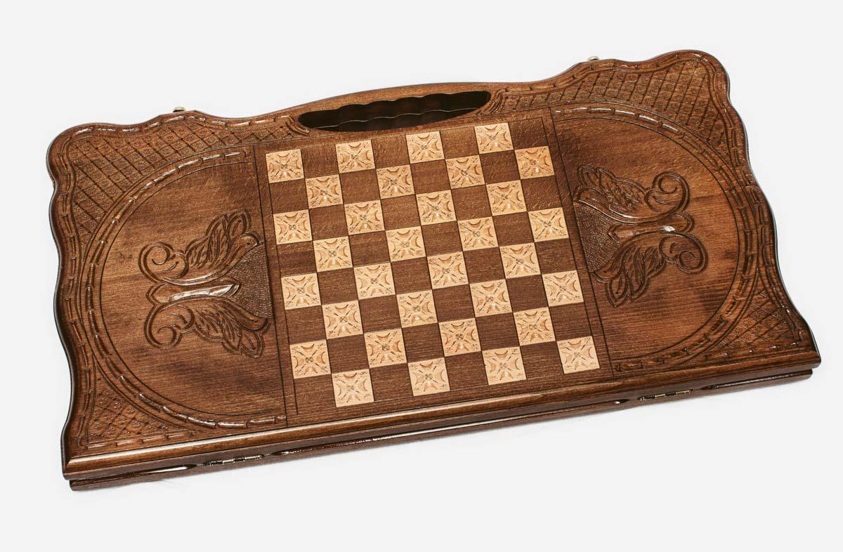 Angled view of the eagle and octagon carved backgammon board