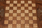 Side view of the folded board with its carry handle