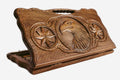 Carved beechwood backgammon board with an eagle in an octagonal star ornament and a carry handle, propped open