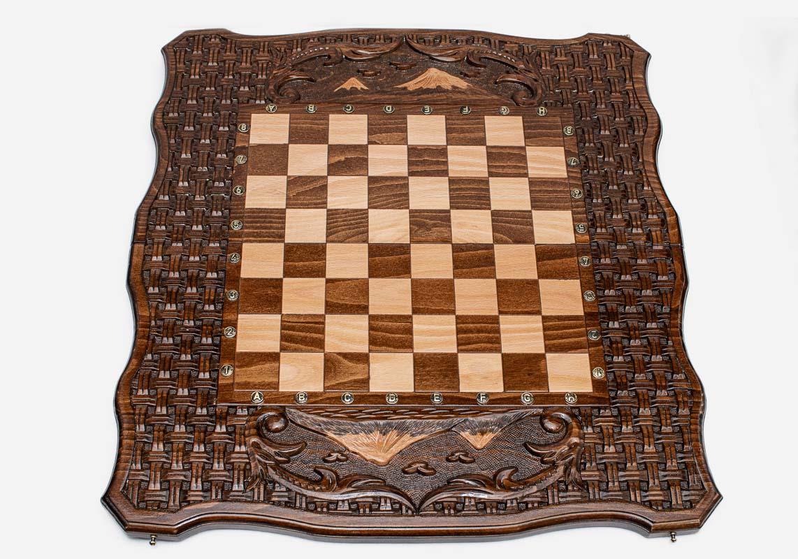 Both peaks of Ararat hand-carved across the wooden chessboard