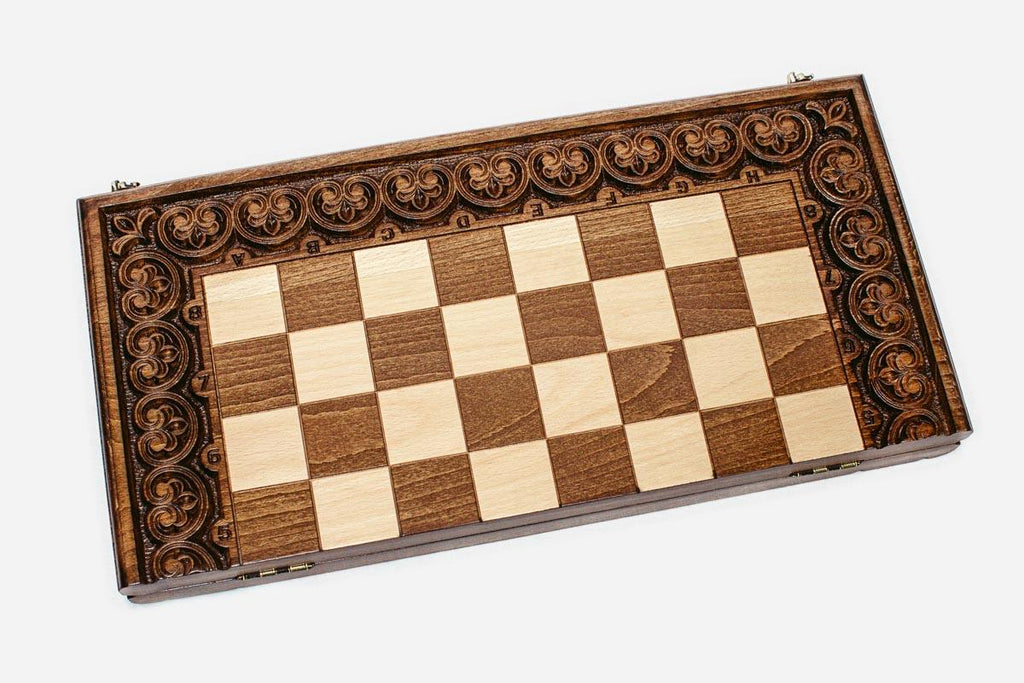 Ornament-carved chess set shown folded