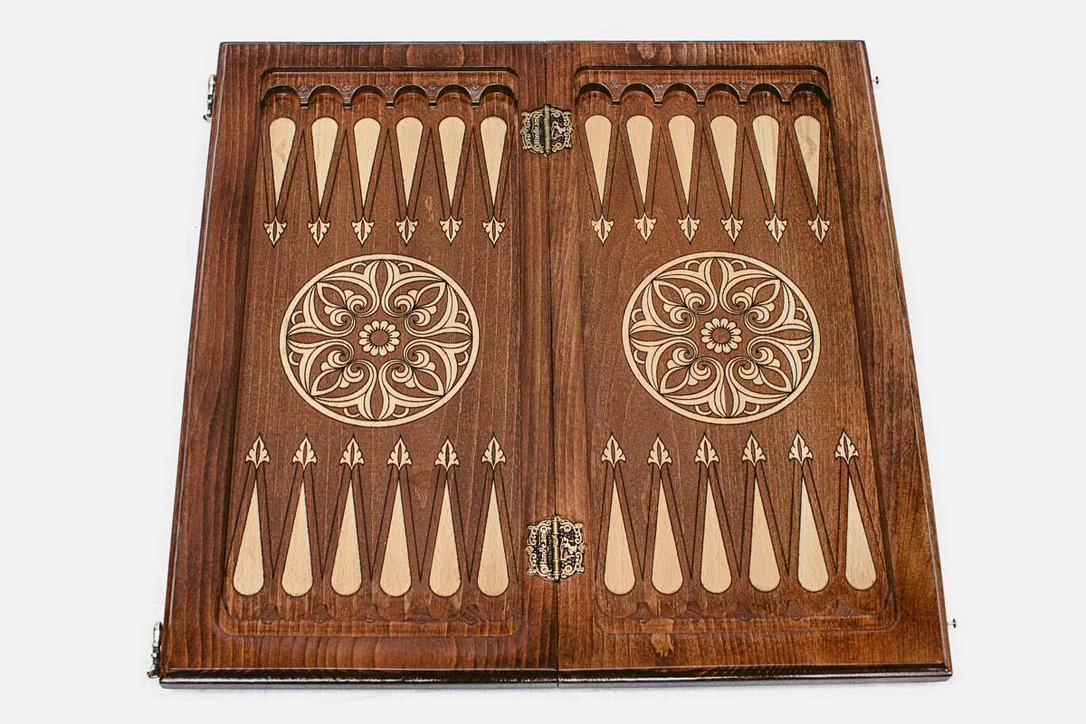 Close-up of the carved ornament on the beech board