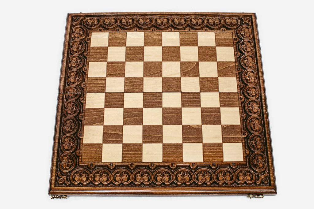 Floral ornament framing the wooden chessboard