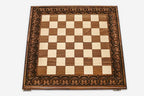 Floral ornament framing the wooden chessboard